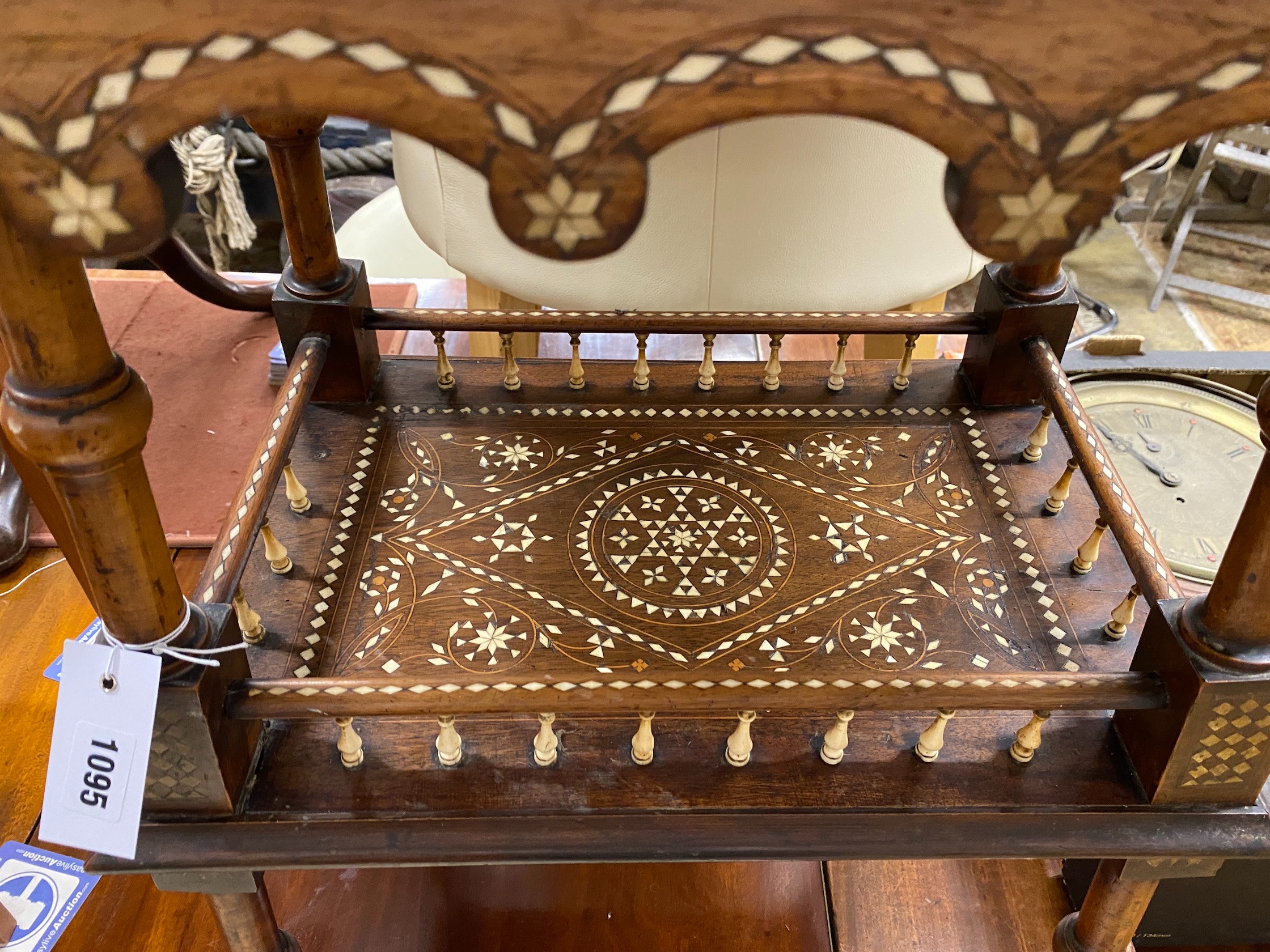 A Damascan bone inlaid two tier table, width 59cm, depth 44cm, height 76cm